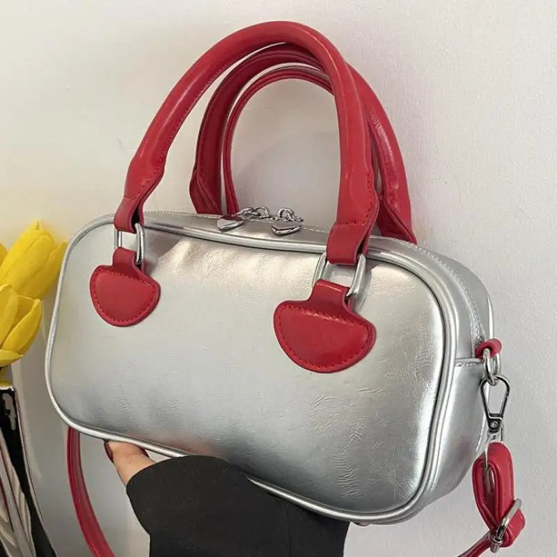 Bolsos de mujer Hit Color 2024 Nuevo bolso de almohada Bolso de mano de cuero de PU Bolso de mensajero de hombro que combina con todo Europa y Estados Unidos