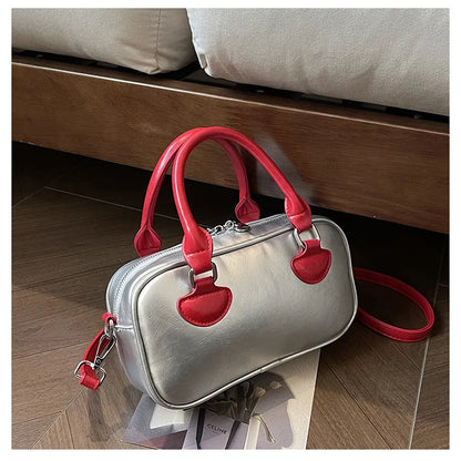 Bolsos de mujer Hit Color 2024 Nuevo bolso de almohada Bolso de mano de cuero de PU Bolso de mensajero de hombro que combina con todo Europa y Estados Unidos