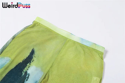 Pantalones rectos con efecto tie-dye de malla con diseño de gatito extraño para mujer, tendencia sexy de verano, ajustados y transparentes, ropa de calle, pantalones elásticos salvajes para actividades