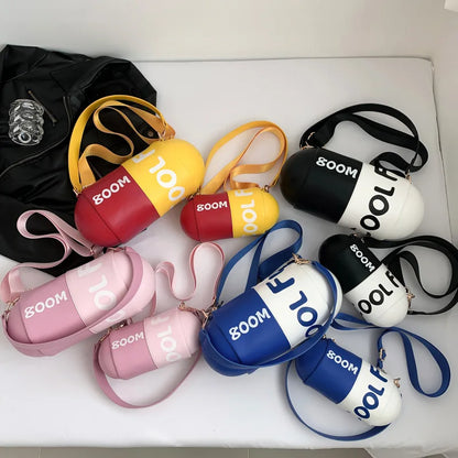 Bolso bandolera divertido para niñas con forma de píldora