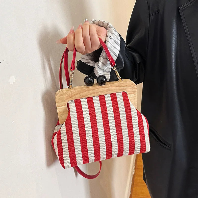 Bolsos de hombro elegantes con diseño de rayas y clip de madera para mujer, bolsos cruzados, carteras de mano para fiesta 2024