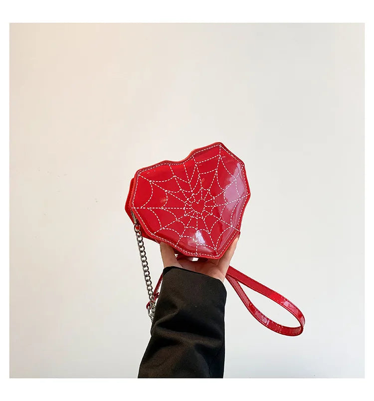 Bolso de hombro de PU con diseño de estampado de telaraña y forma de corazón, nuevo bolso cruzado con cadena de herrajes personalizado, 2024