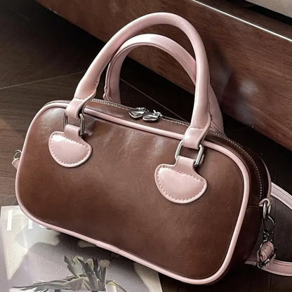 Bolsos de mujer Hit Color 2024 Nuevo bolso de almohada Bolso de mano de cuero de PU Bolso de mensajero de hombro que combina con todo Europa y Estados Unidos