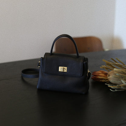 Mini sac portable en cuir de vachette de première couche