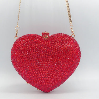 Bolsa de cena con forma de corazón y forma de mano con diamantes