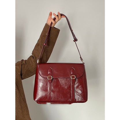 Bolso bandolera vintage color vino tinto