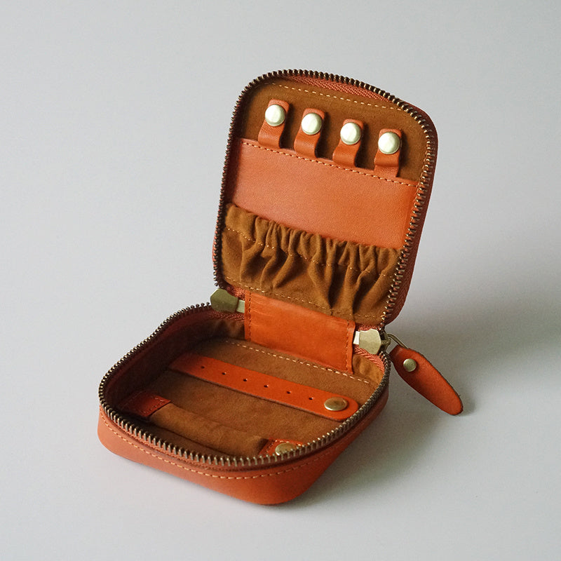 Estuche de maquillaje de cuero vintage con joyero