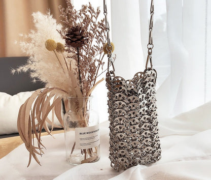 Handmade metal sequin mobile phone bag with concave design