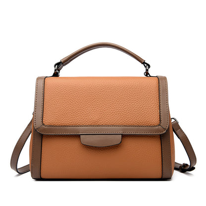 Bolso de mano de cuero suave y texturizado, elegante y moderno