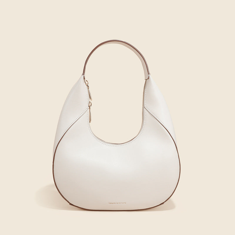 Sac à bandoulière polyvalent pour femme au design spécial en cuir véritable de haute qualité