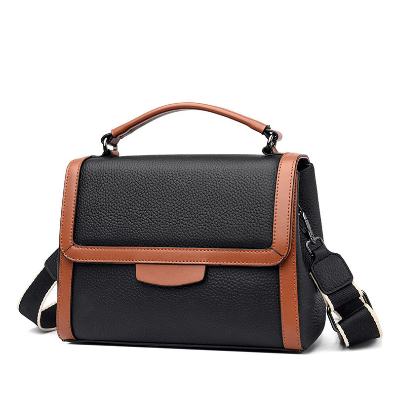 Bolso de mano de cuero suave y texturizado, elegante y moderno