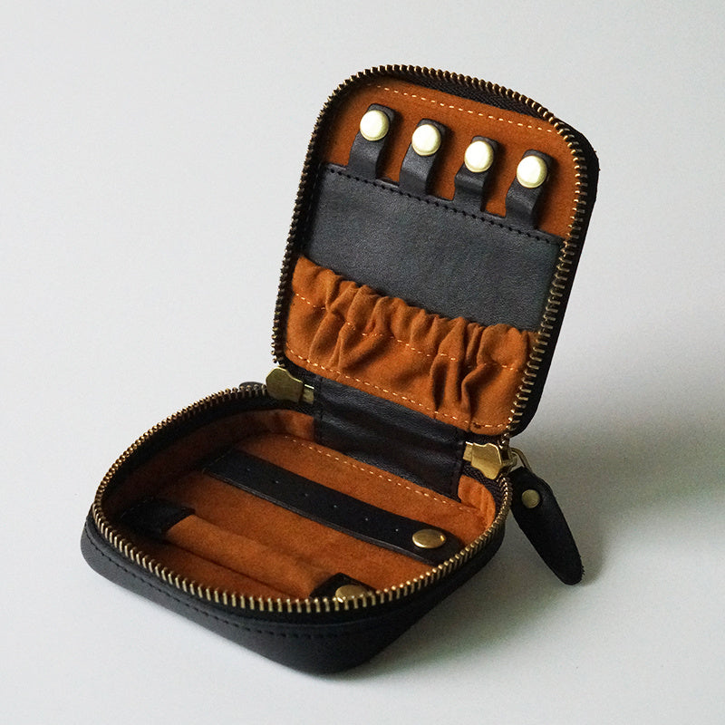 Estuche de maquillaje de cuero vintage con joyero