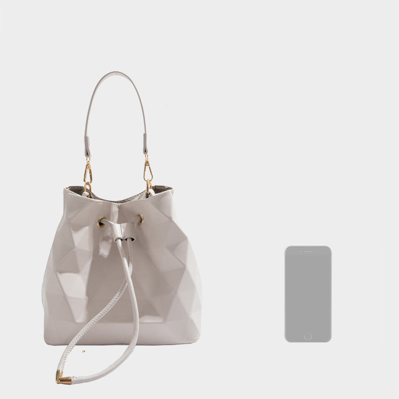 Bolso bandolera con forma de cubo y diseño de láser para mujer