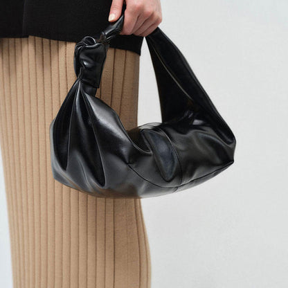 Bolso de mano sencillo, versátil y elegante para llevar debajo del brazo